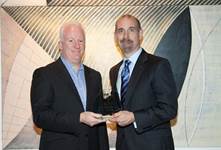Receiving the PMI GEC member's plaque